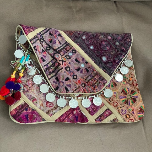 Antik Batik coin fabric clutch New